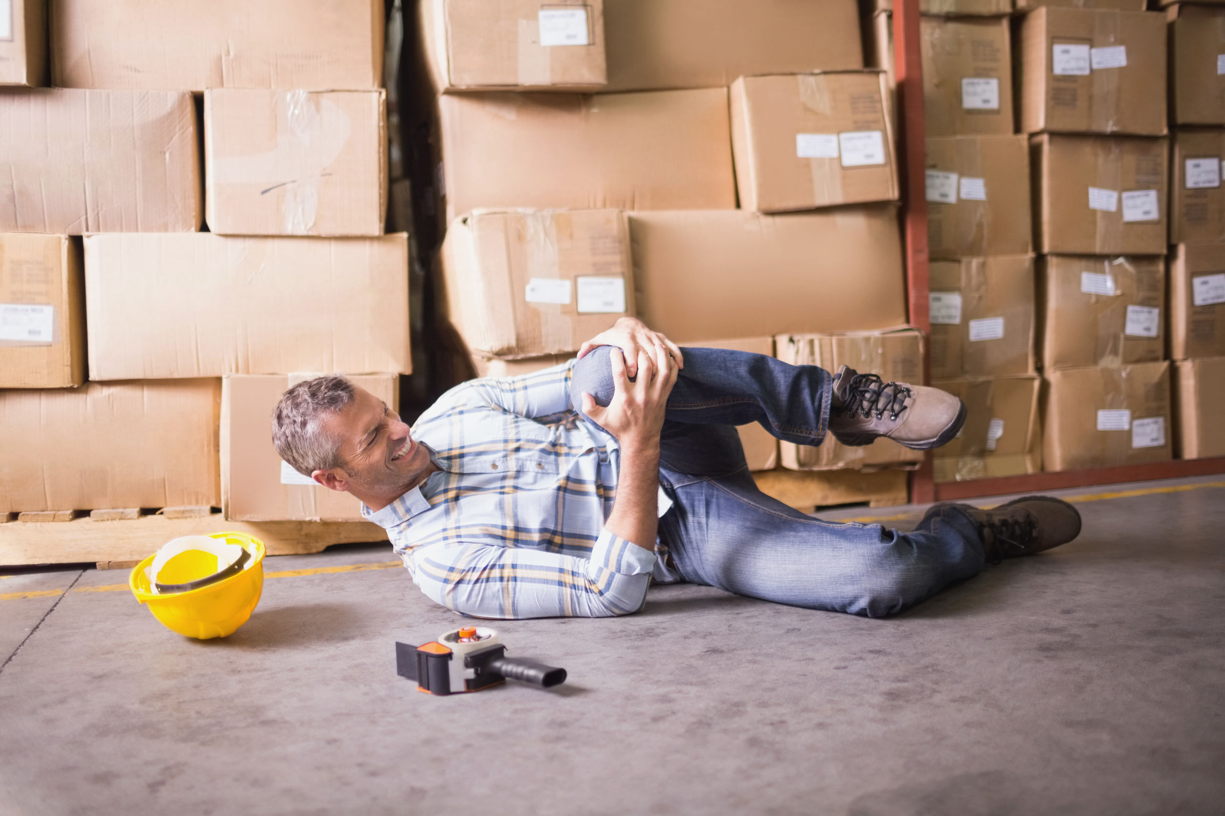 31882430 - side view of male worker lying on the floor in warehouse Workers’ compensation attorneys offer a variety of services to their clients. The workers’ compensation is the amount that must be paid to a worker by the employer if they have…